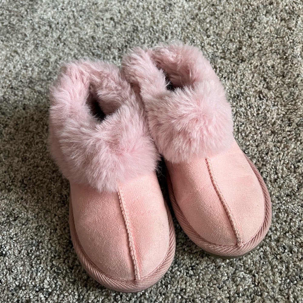 Pink furry slippers with hard sole
